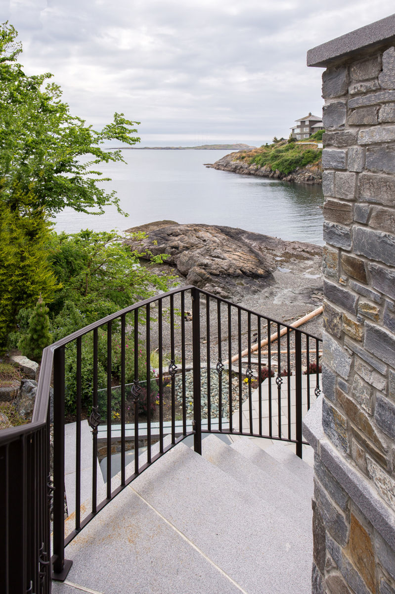 exterior staircase down to beach from King George Terrace home